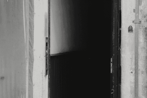 A door, open, from the street.